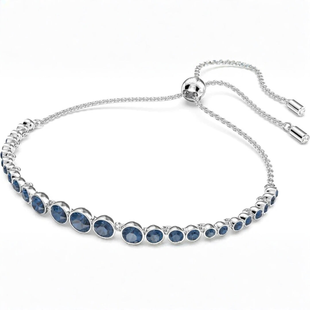 Round Cut Sapphire Tennis Bracelet In White Gold