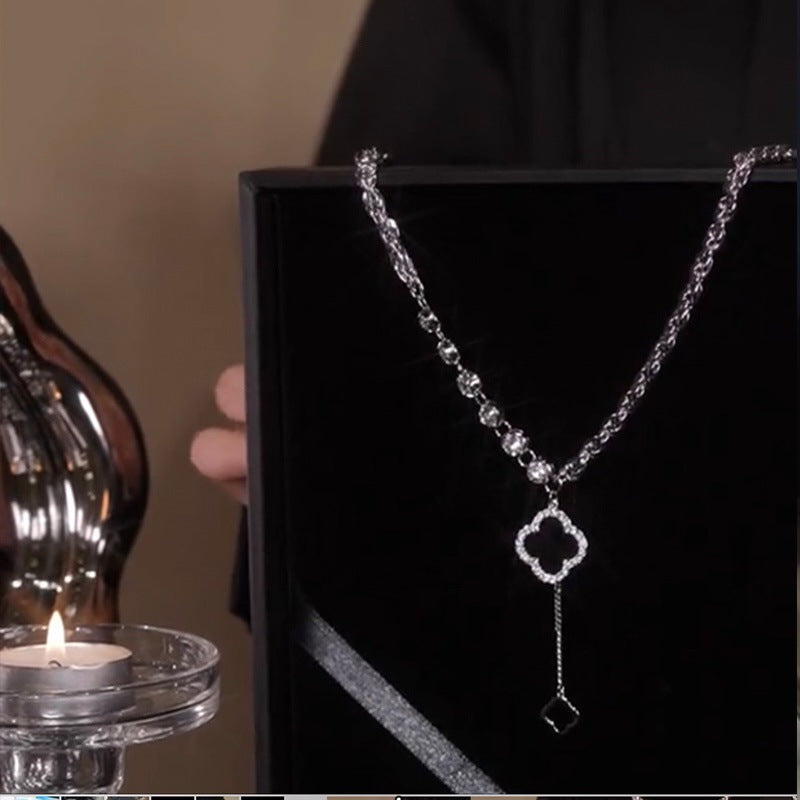 Light Black Four-petal Flower Pendant Necklace Female Niche Design Sweater Chain Flower Necklace Jewelry