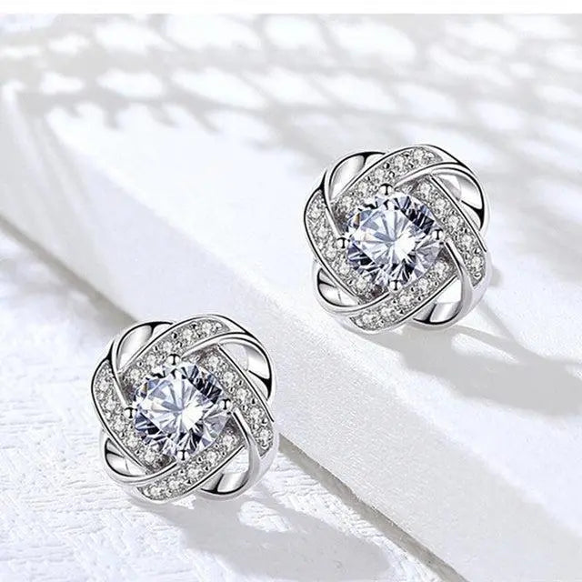 Spiral Flower Cross Earrings