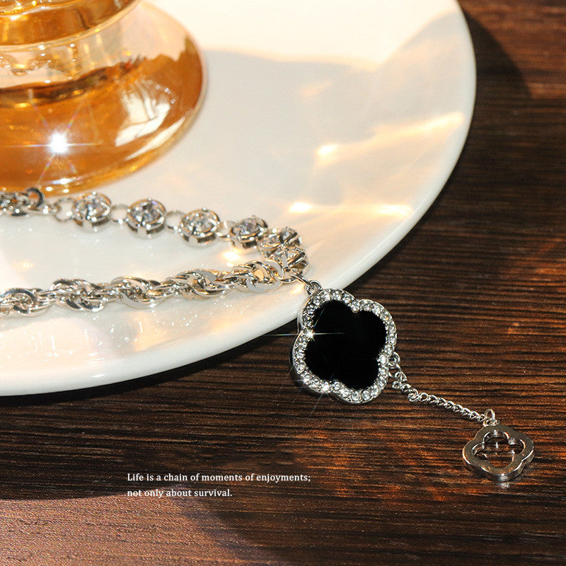 Light Black Four-petal Flower Pendant Necklace Female Niche Design Sweater Chain Flower Necklace Jewelry