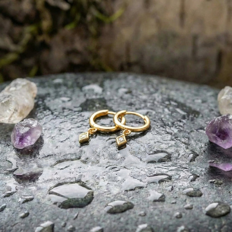 An Elegant Minimalist Gold Drop Huggie Earring Set