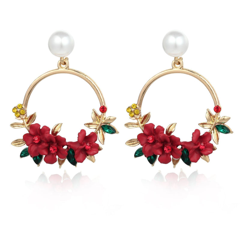 Flower And Pearl Earrings In Gold