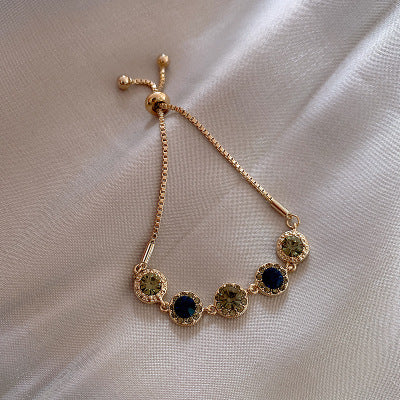 Green Crystals Bracelet In Gold