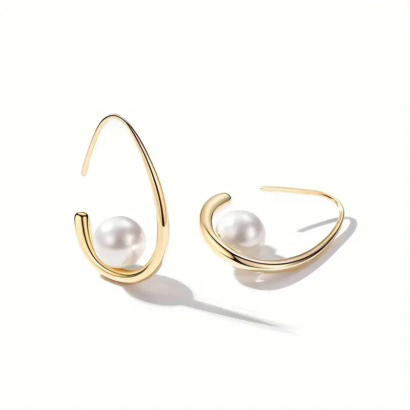 Elegant Pearl And Gold Earrings